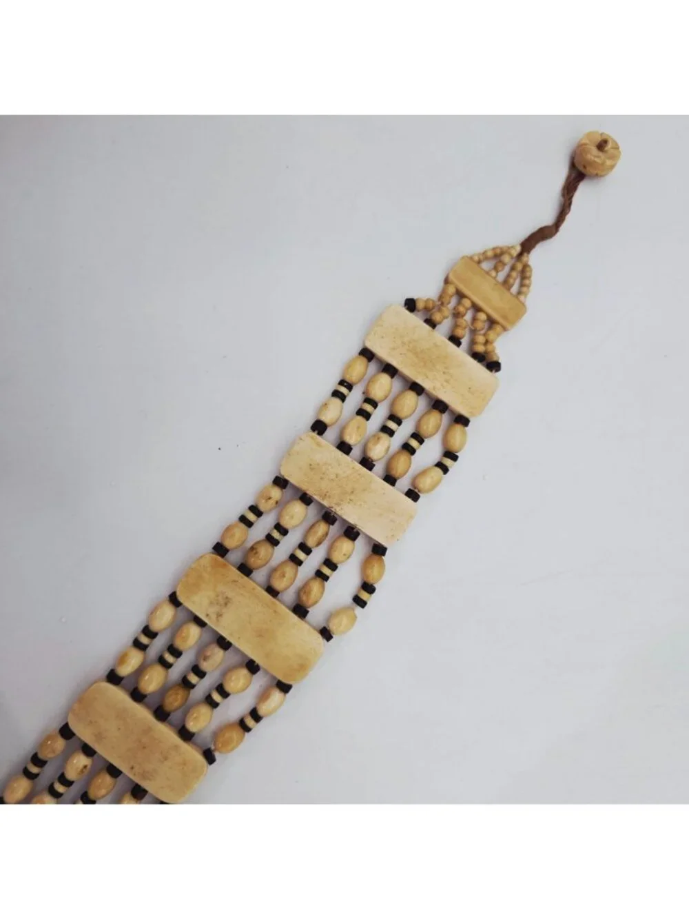 Hand-Carved Bone Beaded Belt With Intricate Leaf Pattern & Button Closure
